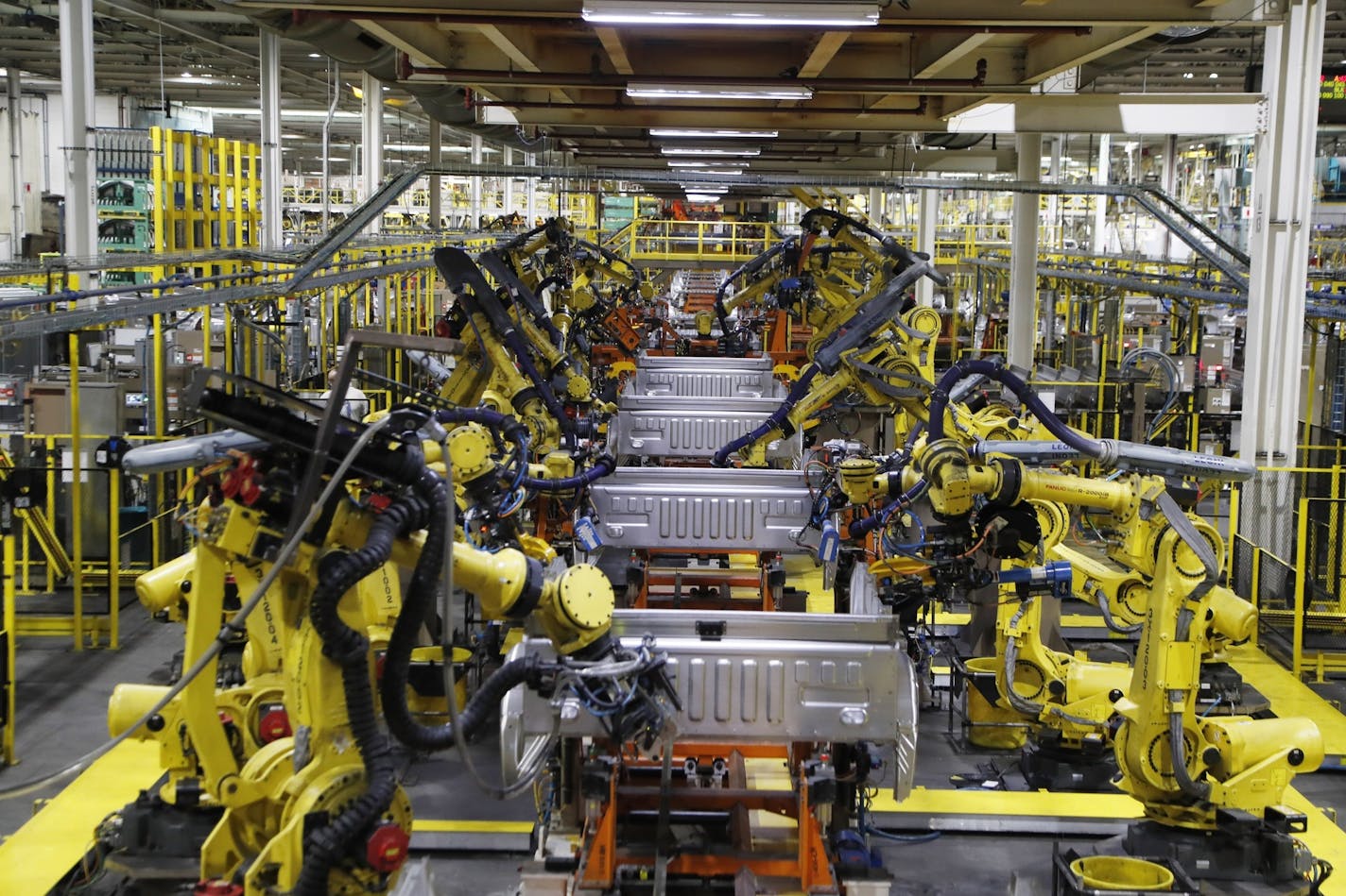 Auto plants like the Ford Rouge plant in Dearborn, Mich., which assembles F-150 trucks, helped boost the manufacturing index in May as they reopened. (AP Photo/Carlos Osorio, File)