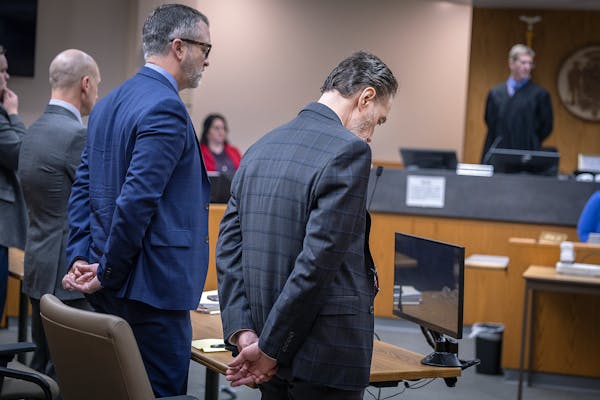 Nicolae Miu, right, stands alongside his defense and waits as the jury leaves the courtroom after requesting to watch the Jawahn Cockfield video durin