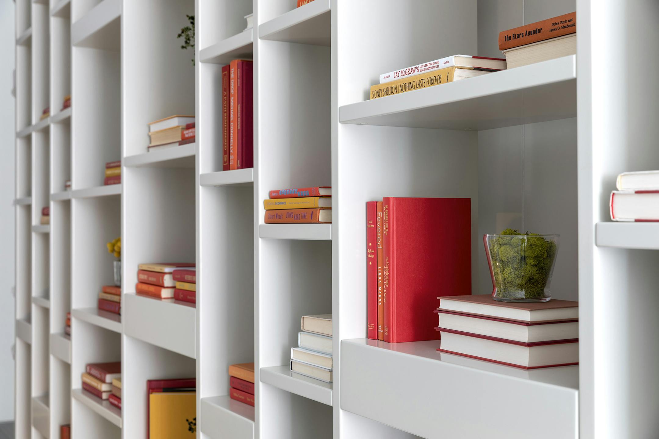 Color coordination for bookshelves can help make shelves feel less messy and more cohesive. (Design Recipes/TNS)
