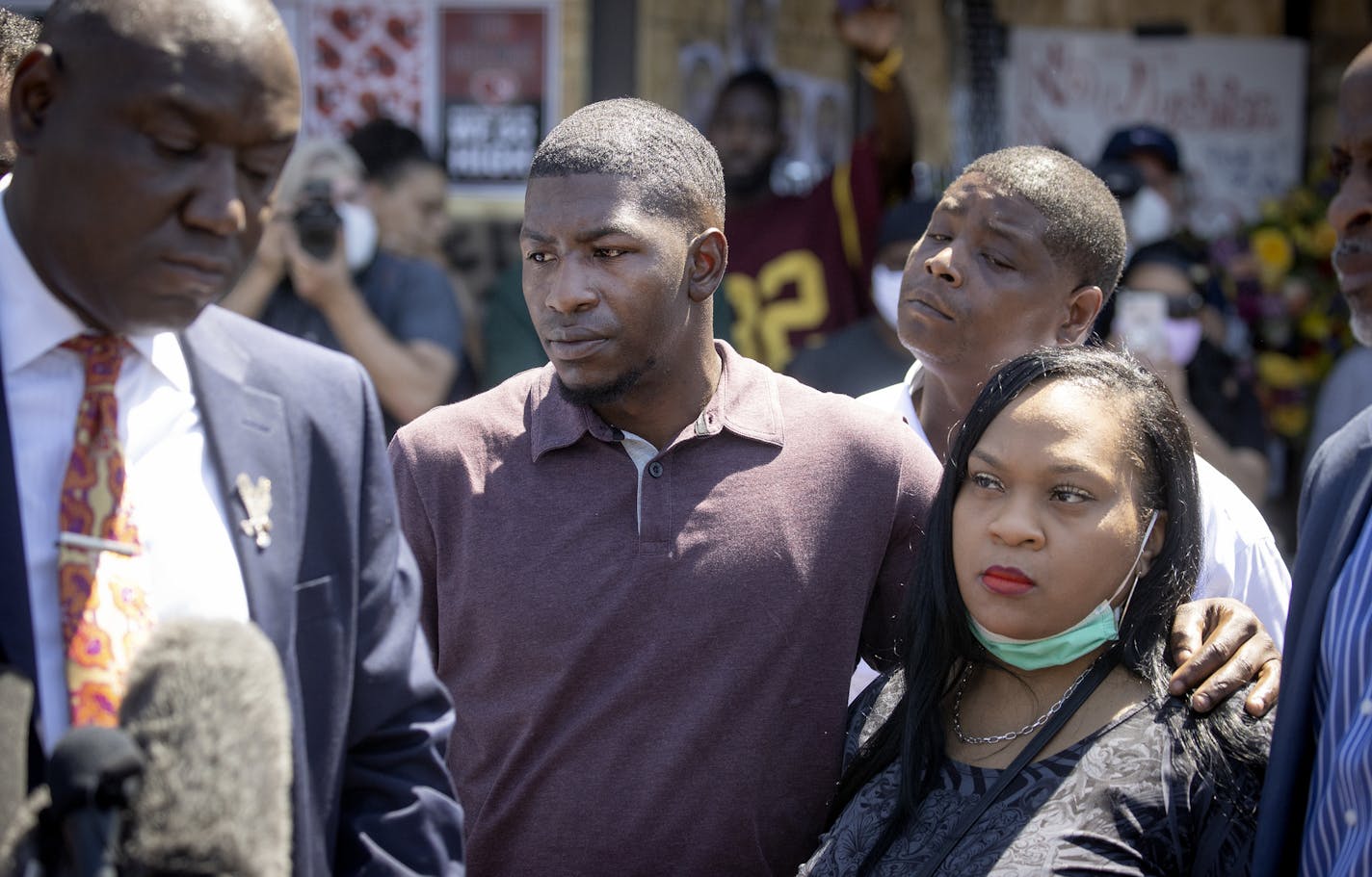 Nationally renowned civil rights attorney Ben Crump, left, stood in solidarity with George Floyd's son Quincy Mason Floyd as they addressed the media at the site where Floyd was killed, Wednesday, June 3, 2020. ] ELIZABETH FLORES • liz.flores@startribune.com