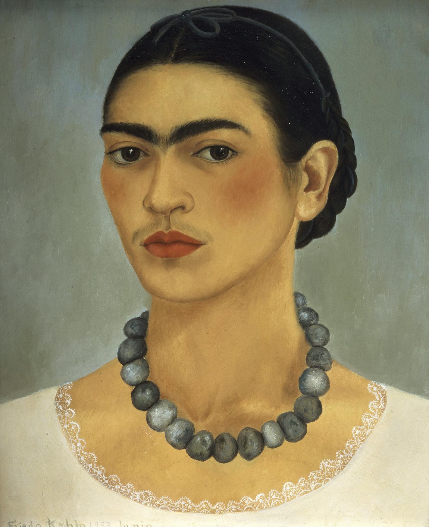 This undated photograph provided by the Jacques and Natasha Gelman Collection of Modern and Contemporary Mexican Art via the Walker Art Center shows Frida Kahlo's painting "Self-Portrait with Necklace," 1933. "Frida Kahlo," an exhibit of her self-portraits, paintings and photographs organized by the Walker Art Center on the centenary of her birth, illustrates how Kahlo has become an icon whose art packs a punch as compelling as her own fight with adversity.