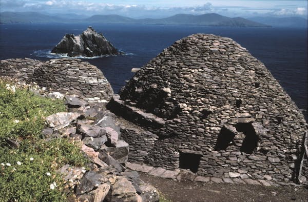 Stone beehive huts atop barren Skellig Michael gave shelter from the years 650 to 1250 to hardy monks in Ireland who sought a close connection to God.