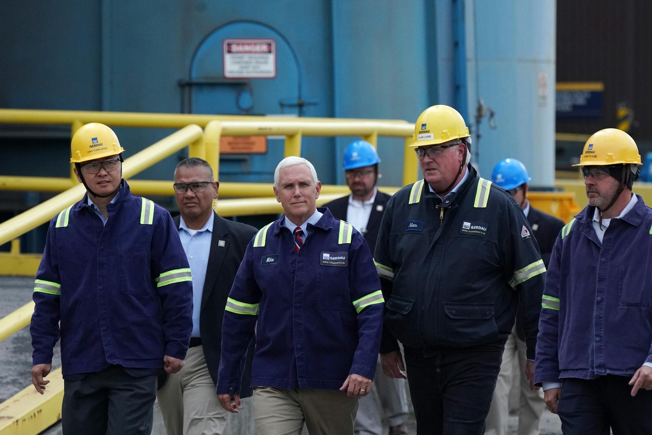 Vice President Mike Pence walked between buildings during a tour of Gerdau Ameristeel Thursday.