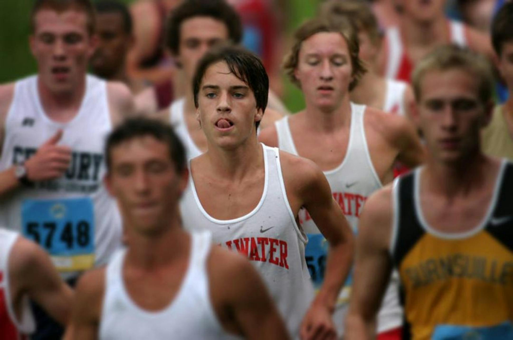 Wayde Hill, center, Stillwater cross country, 2011Photo by Brad Dixon