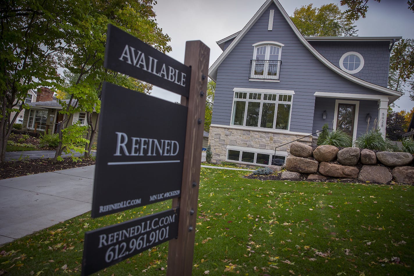 A Refined Custom Home next to an older home in the Pamela Park Neighborhood in Edina.