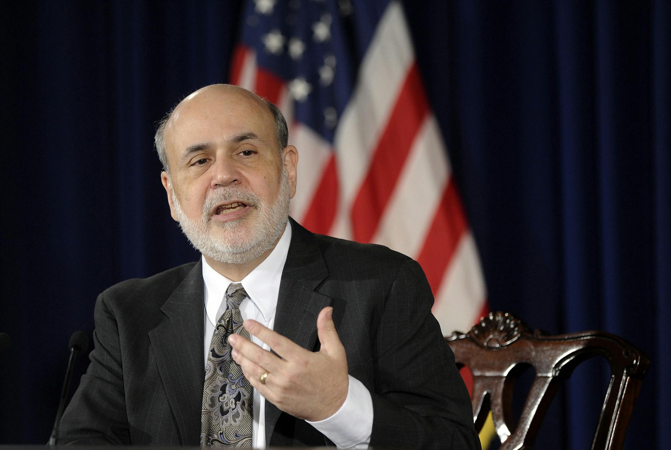 Federal Reserve Chairman Ben Bernanke speaks during a news conference at the Federal Reserve in Washington, Wednesday, Dec. 18, 2013. The Fed will begin to reduce bond purchases by $10 billion in January because of a stronger U.S. job market.(AP Photo/Susan Walsh) ORG XMIT: MIN2013121915460262