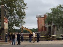 Parking lot demolition was underway Saturday afternoon at the Terrace Theatre in Robbinsdale. Earlier, a court stay halted the process at the actual t