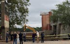 Parking lot demolition was underway Saturday afternoon at the Terrace Theatre in Robbinsdale. Earlier, a court stay halted the process at the actual t