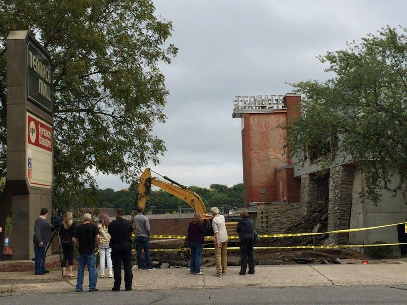 Parking lot demolition was underway Saturday afternoon at the Terrace Theatre in Robbinsdale. Earlier, a court stay halted the process at the actual theater building.