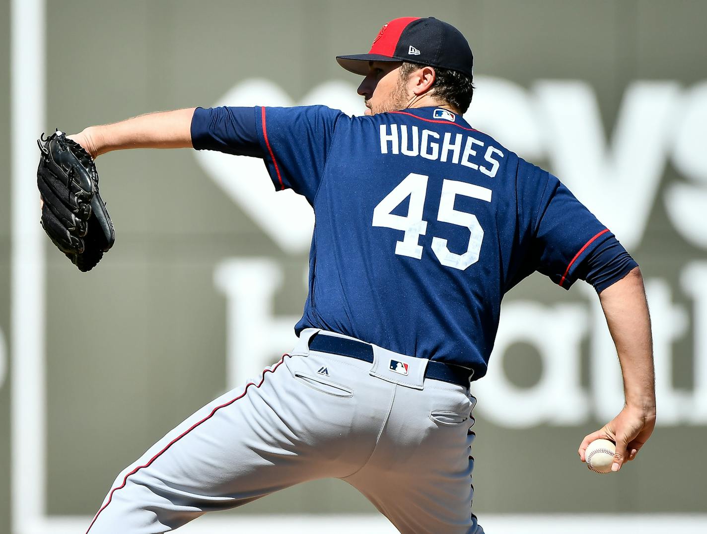 Minnesota Twins starting pitcher Phil Hughes (45) threw a pitch in the bottom of the first inning Saturday. ] AARON LAVINSKY &#xef; aaron.lavinsky@startribune.com The Minnesota Twins played the Boston Red Sox on Saturday, Feb. 25, 2017 at JetBlue Park in Fort Myers, Fla.