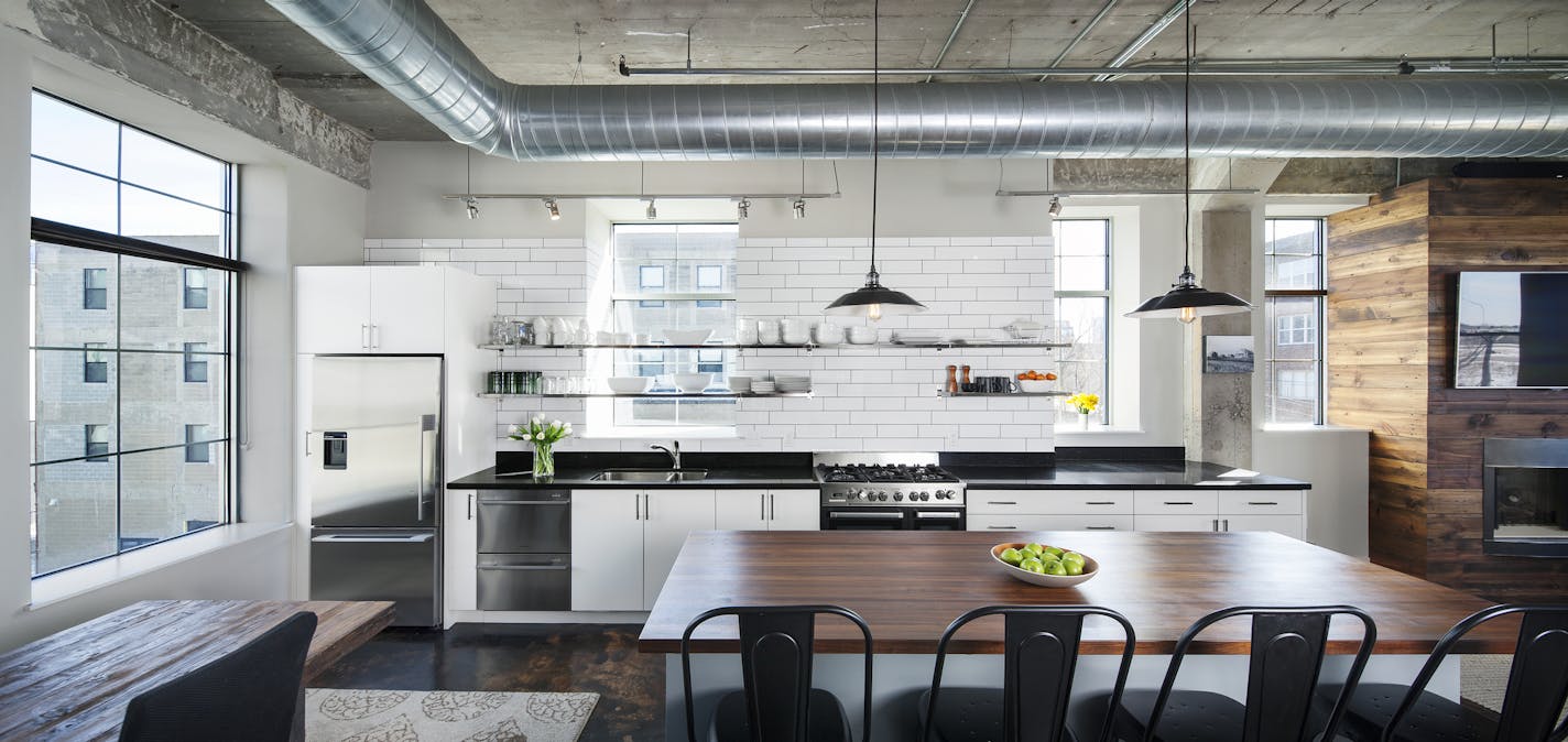 Home of the Month: North Loop loft makeover mixes soft textures with a hard industrial backdrop, by Albertsson Hansen Architecture. Credit Pete J. Sieger