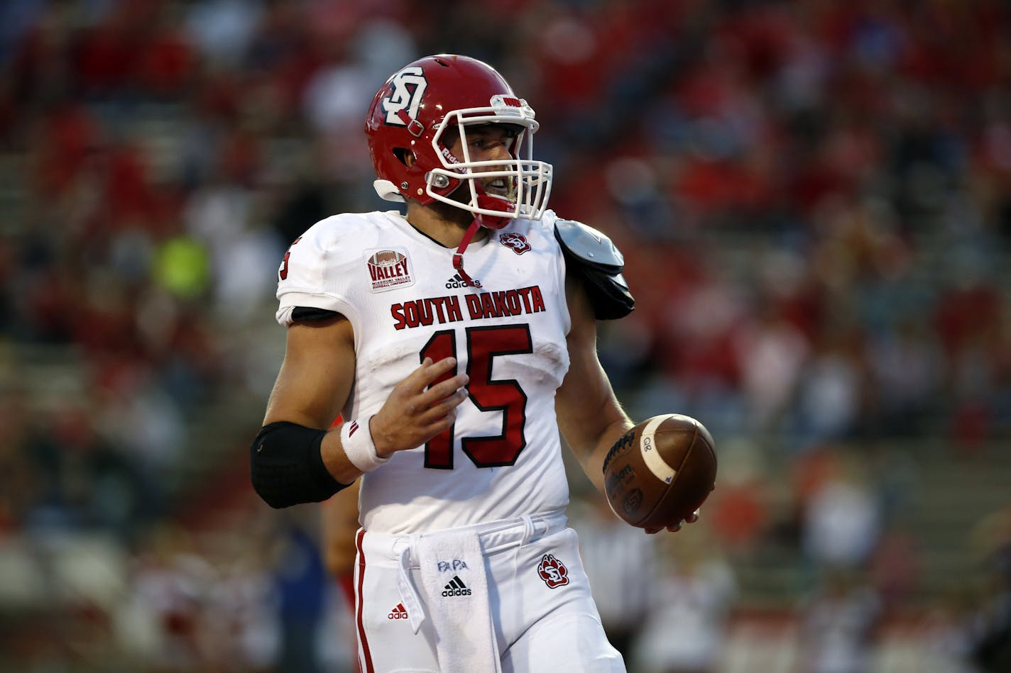 South Dakota quarterback Chris Streveler pauses after scoring a touchdown during the first half of an NCAA college football game against New Mexico in Albuquerque, N.M., Thursday, Sept. 1, 2016. (AP Photo/Andres Leighton) ORG XMIT: OTKAL122