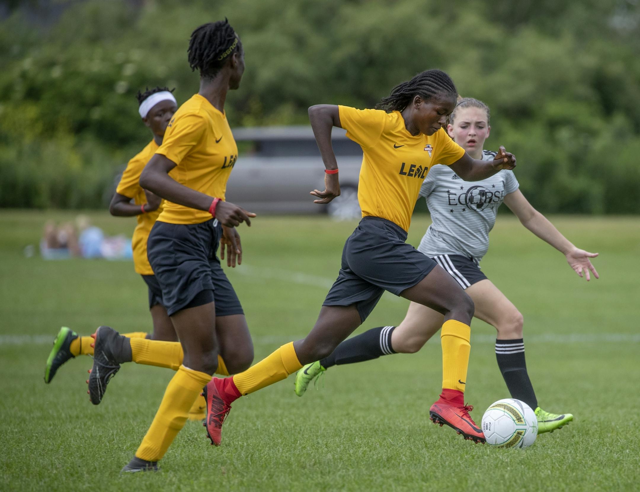 Monrovia Football Academy's Oretha Tokpah drove the ball down the field for a goal as they took on Eclipse Select MN Regional during the USA Cup tournament, Tuesday, July 16, 2019 at the National Sports Center in Blaine, MN. The youth soccer team from Liberia traveled to Minnesota for its first trip to the States, to play in the mega-tourney and were supported by the local Liberian community. Monrovia defeated Minnesota 9-1.