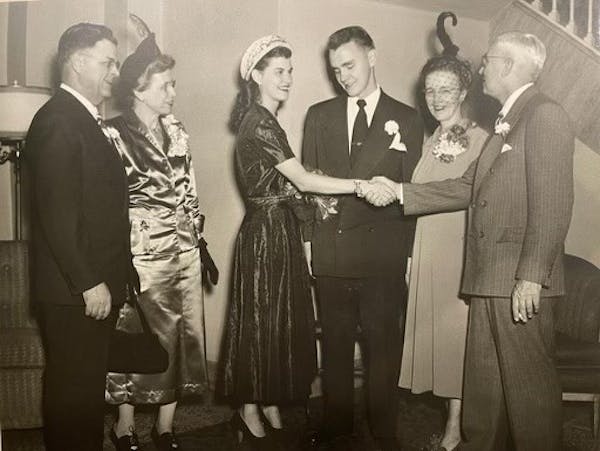 Newlyweds Kristy and John Juergens were flanked by their parents at their 1948 wedding in Columbia Heights. Clarence and Kitty Olsen are at left, Leon