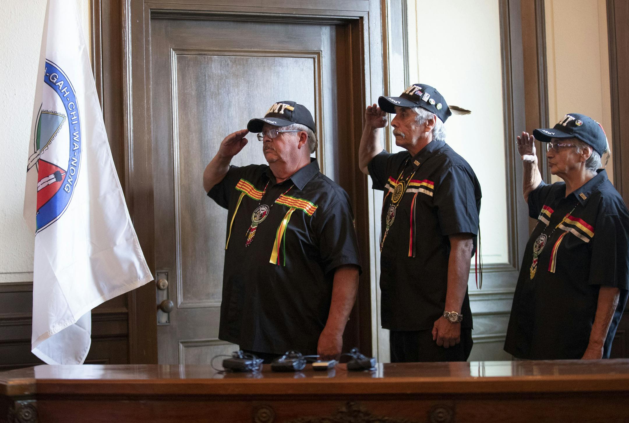 Members of the Fond Du Lac Honor Guard stood at attention facing the newly dedicated flag. ]
ALEX KORMANN • alex.kormann@startribune.com The Fond du Lac indigenous people were officially welcomed to City Hall with a flag raising ceremony. The tribal flag will now be displayed prominently in Council Chambers.