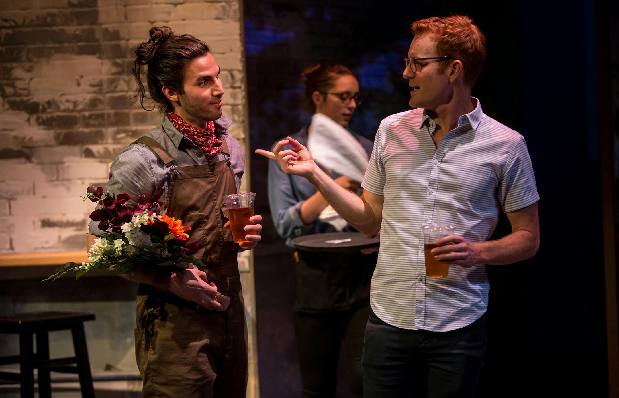 Michael Hanna as Benoit and Kasey Mahaffy as David in "Le Switch" at the Jungle Theater. PHOTO CREDIT: Dan Norman