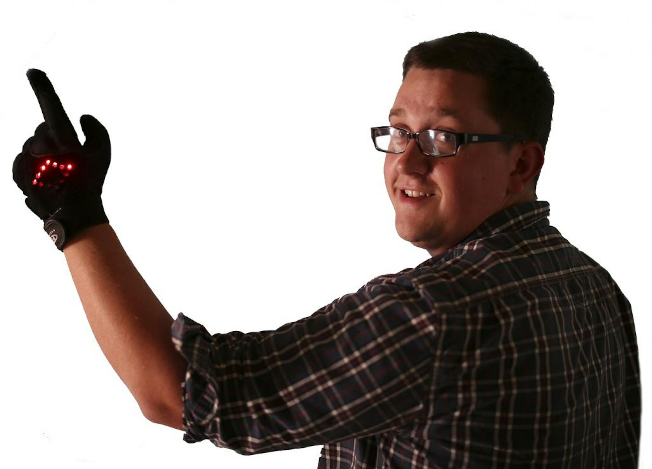 Shown here in "pointing mode," Anthony Carton's LED-outfitted glove enables bicyclists to signal any change in direction.