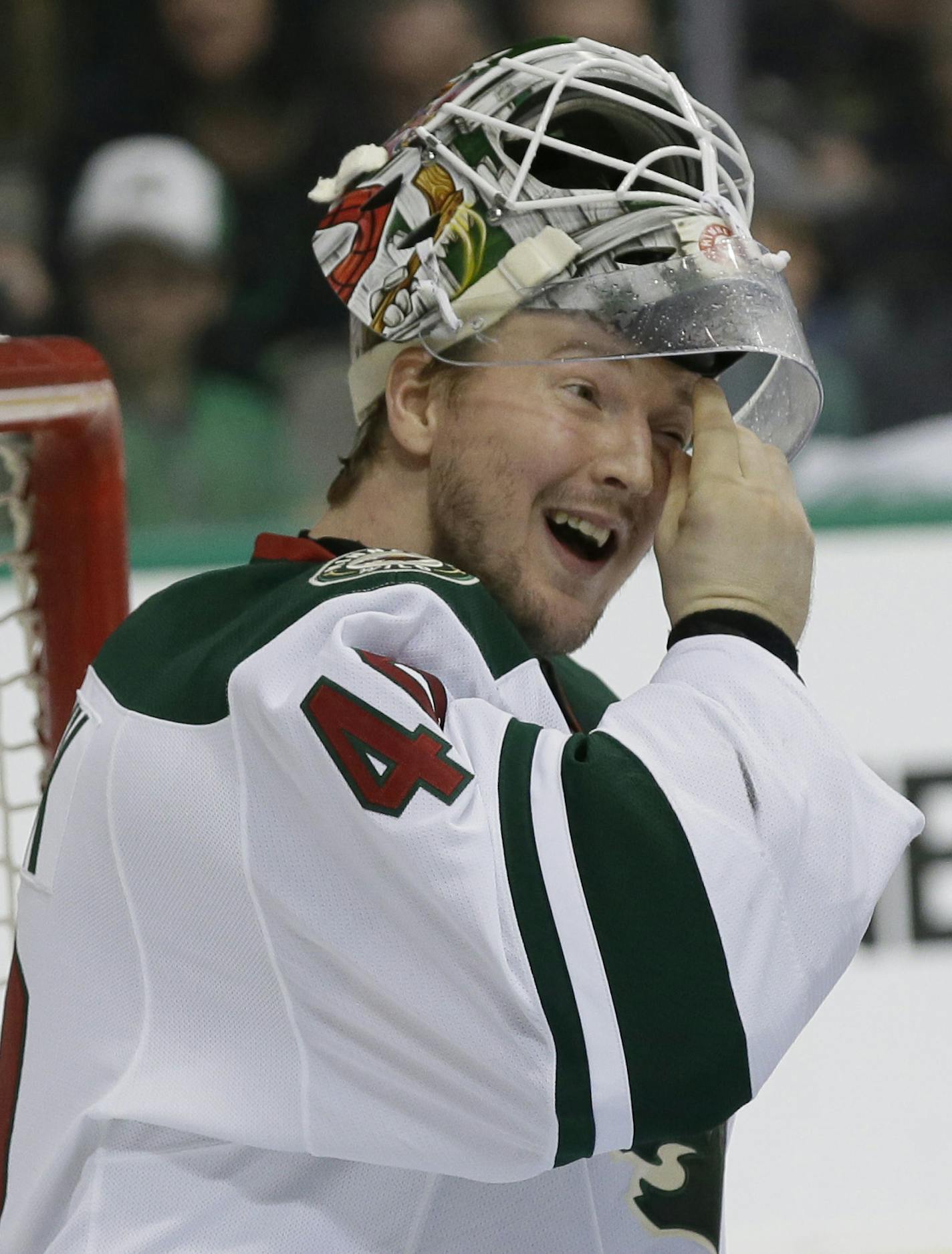 Minnesota Wild goalie Devan Dubnyk (40) is checked on by linesman Brad Kovachik (71) during the first period in Game 2 in the first round of the NHL Stanley Cup playoffs against the Dallas Stars Saturday, April 16, 2016, in Dallas. (AP Photo/LM Otero)