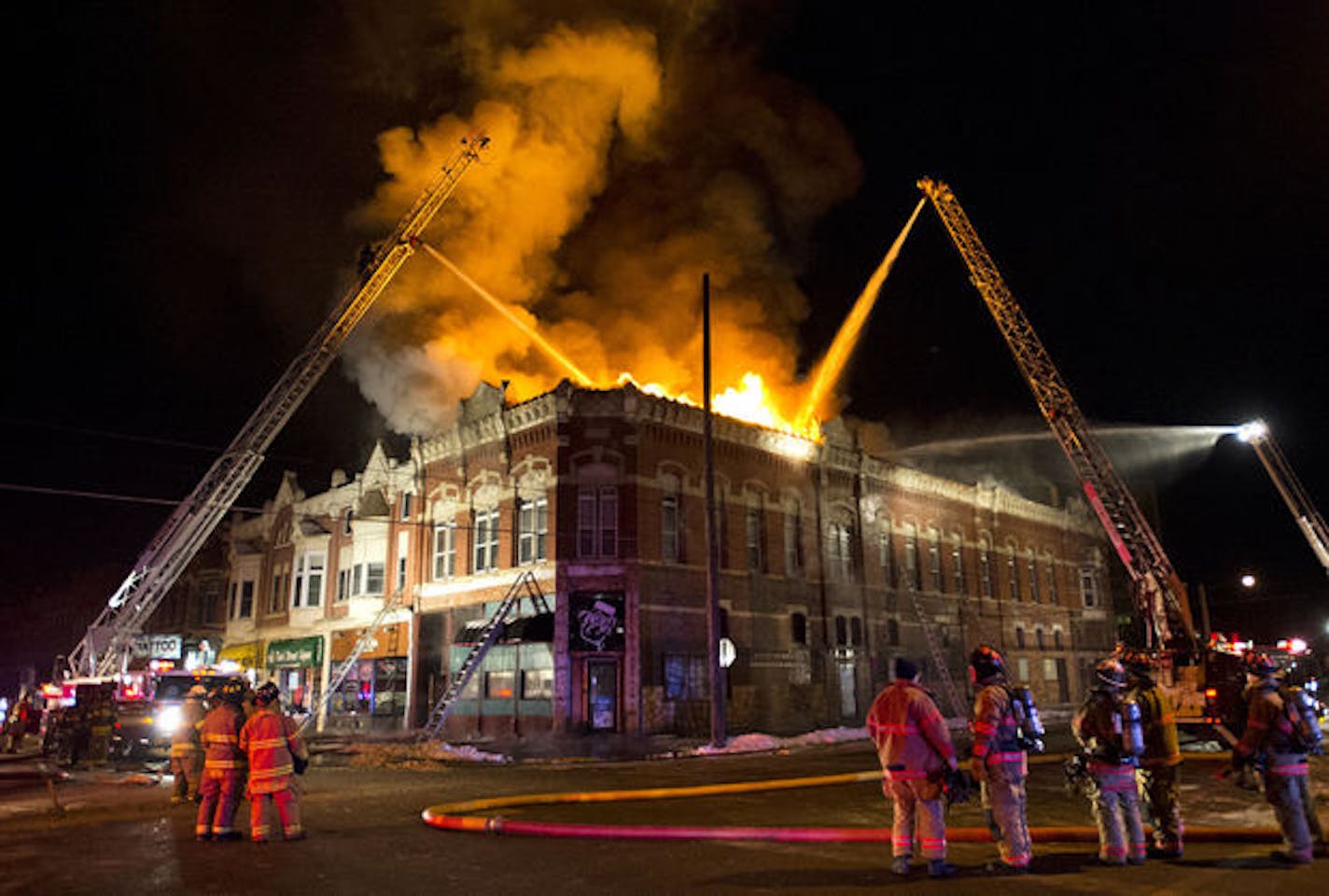 Winona and Goodview firefighters battle a fire at 151 E. Third St. in downtown Winona early Friday, Feb. 6, 2015, morning.