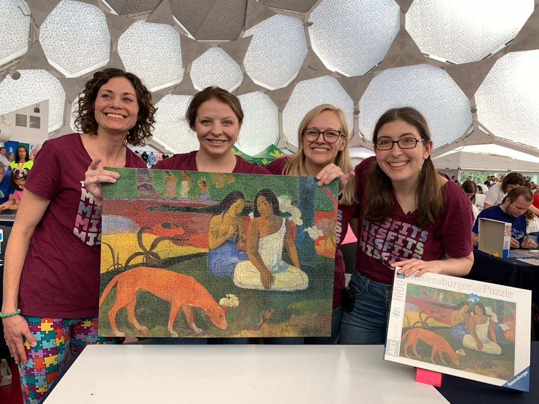 The Misfits, an American team, took second place in the World Jigsaw Puzzle Championship. From left, Elizabeth Caron, Michaela Keener, Sarah Schuler and Karen Kavett.