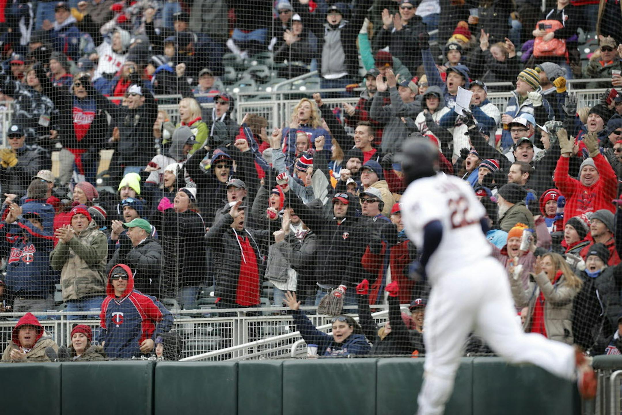The crowd cheers after Minnesota Twins third baseman Miguel Sano (22) hit a home run in the sixth inning. ] LEILA NAVIDI ï leila.navidi@startribune.com BACKGROUND INFORMATION: The Minnesota Twins home opener against the Seattle Mariners at Target Field in Minneapolis on Thursday, April 5, 2018. The Twins won 4-2.