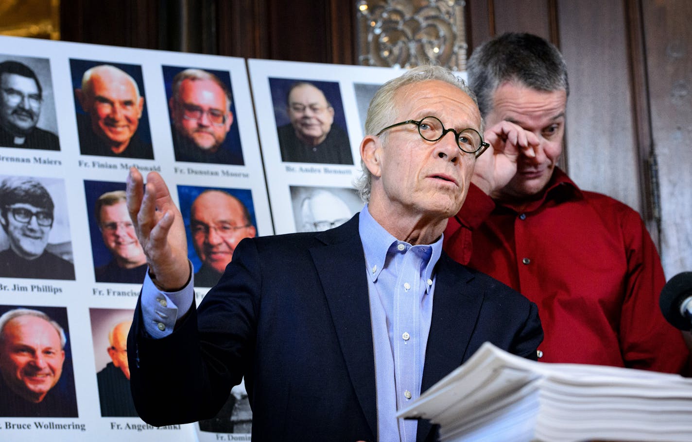 Abuse survivor Troy Bramlage wiped his eyes after attorney Jeff Anderson played a recording of Fr. Allen Tarlton's deposition in which he admitted abusing children. ] GLEN STUBBE * gstubbe@startribune.com Tuesday, April 28, 2015 Attorney Jeff Anderson and his client Troy Bramlage announced a settlement of a civil lawsuit against St. John's Abbey and Fr. Allen Tarlton. St. Paul, MN