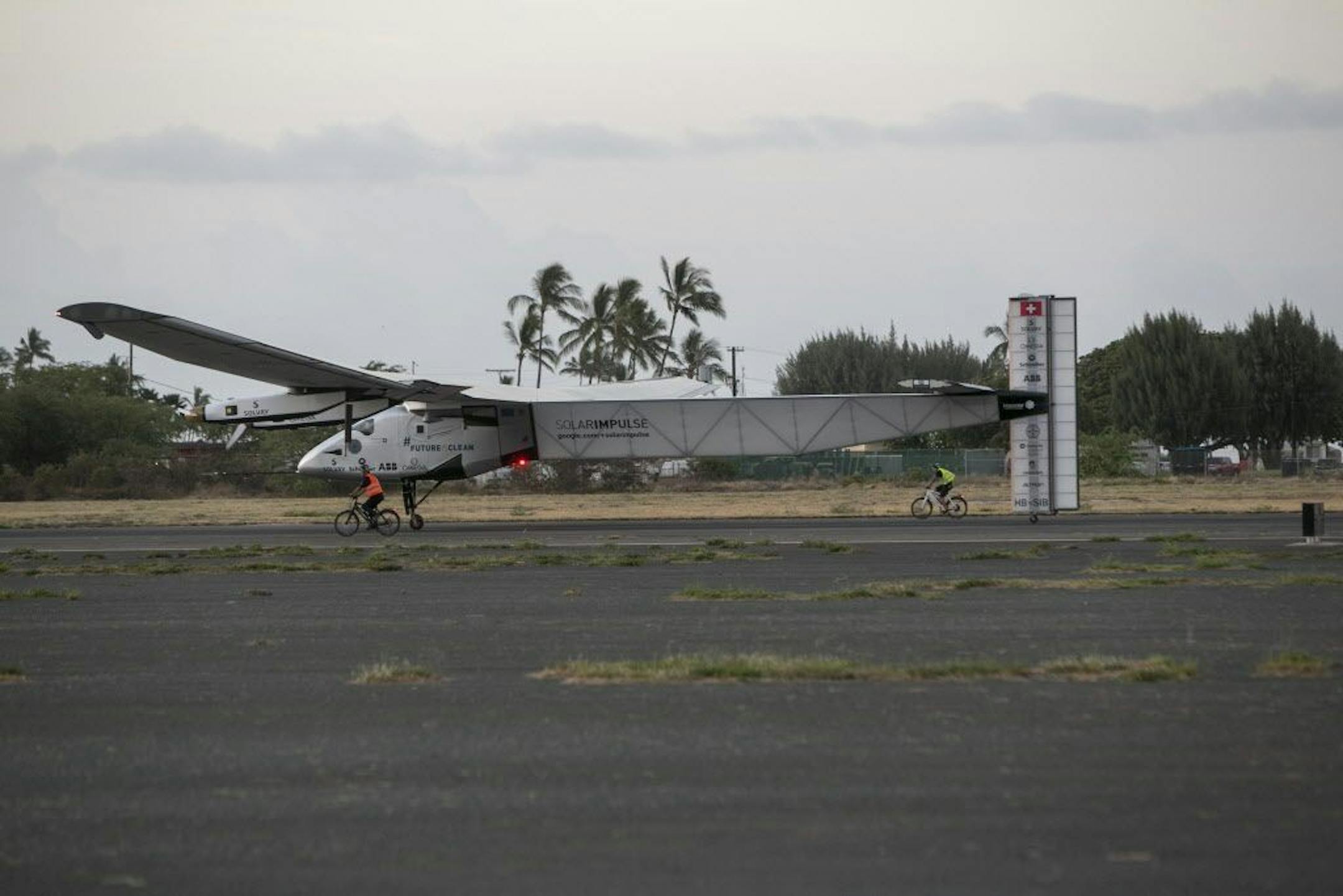 The Solar Impulse 2, a solar-powered airplane, lands at the Kalaeloa Airport, Friday, July 3, 2015 in Kapolei, HI. The plane, piloted by Andre Borschberg, is attempting to fly around the world without fuel.
