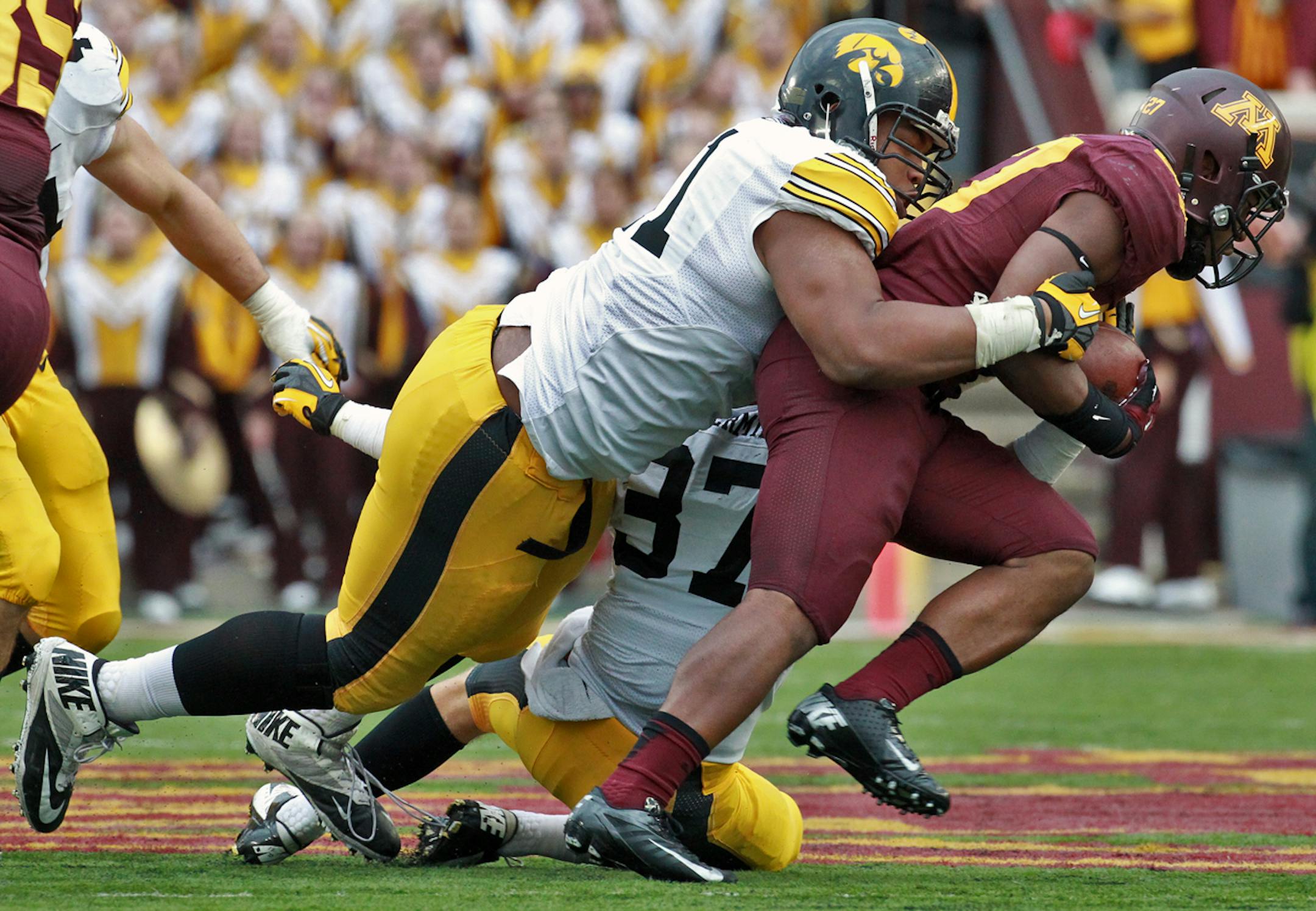 Minnesota running back David Cobb was held for no gain on a 2nd half rushing play in the Big Ten opener against Iowa.