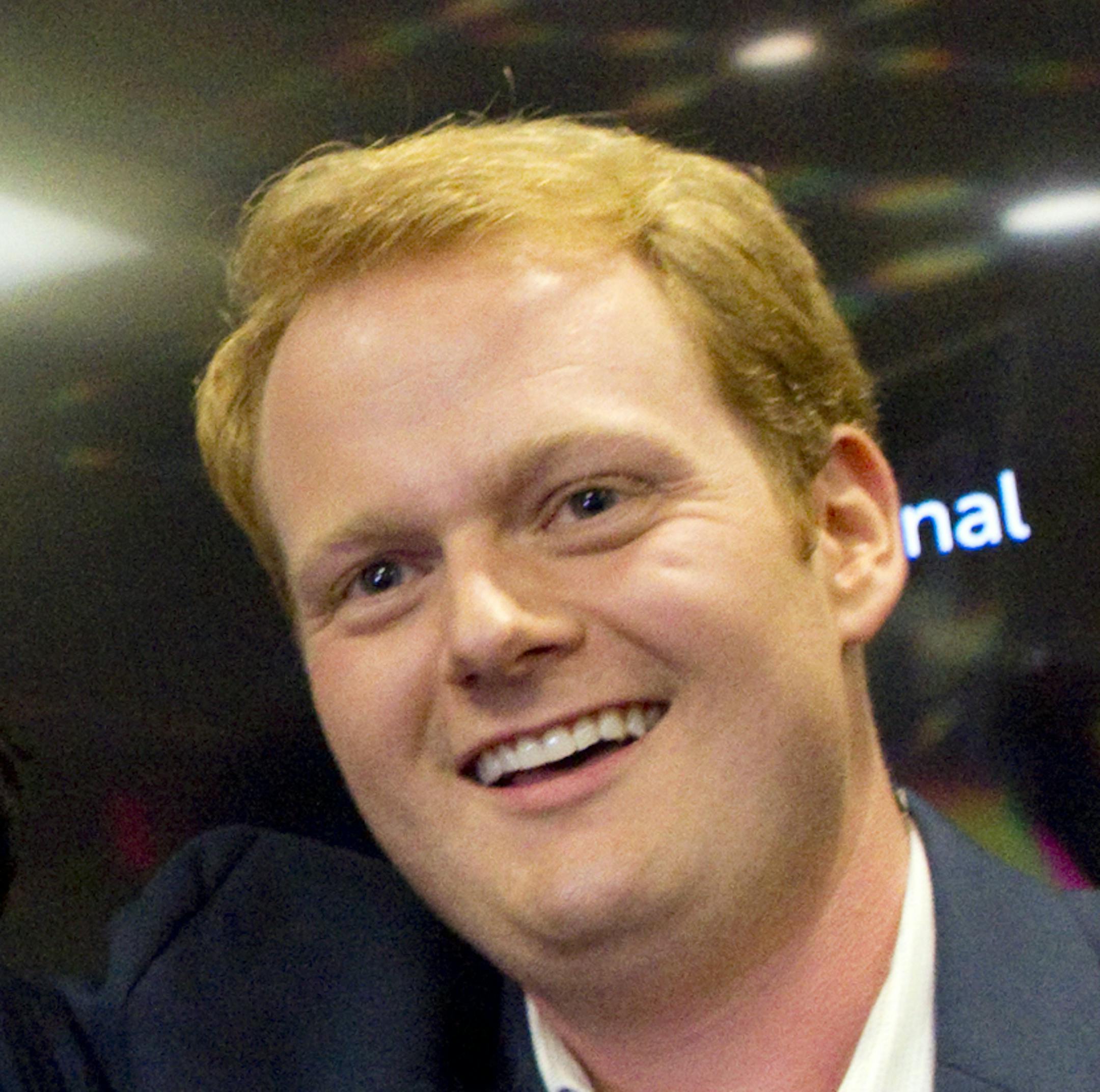 Democrat Chris Hurst defeated Republican Joseph Yost to win House of Delegates District 12 on Tuesday, Nov. 7, 2017, in Blacksburg, Va. Hurst celebrates with a packed room of supporters at The Hyatt Place in Blacksburg. (Heather Rousseau/The Roanoke Times via AP)