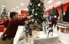 Nina Friis made a last minute touch up to a display at the Roseville Target store on Nov. 3, 2016.