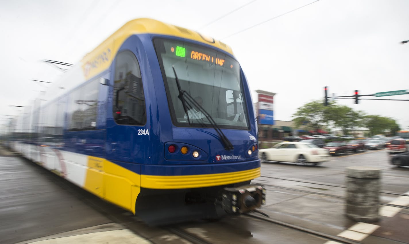 An eastbound Green Line train passed through the intersection at University Avenue and Hamline Avenue on Wednesday, June 3, 2015 in St. Paul. ] Aaron Lavinsky &#x2022; aaron.lavinsky@startribune.com As the anniversary of the Green Line's opening approaches, we take another look to see how development along the line has progressed in the first year. Story focuses on St. Paul's University Avenue, the most challenged stretch of the 11-mile route. Bottom line: while few new projects have emerged sin