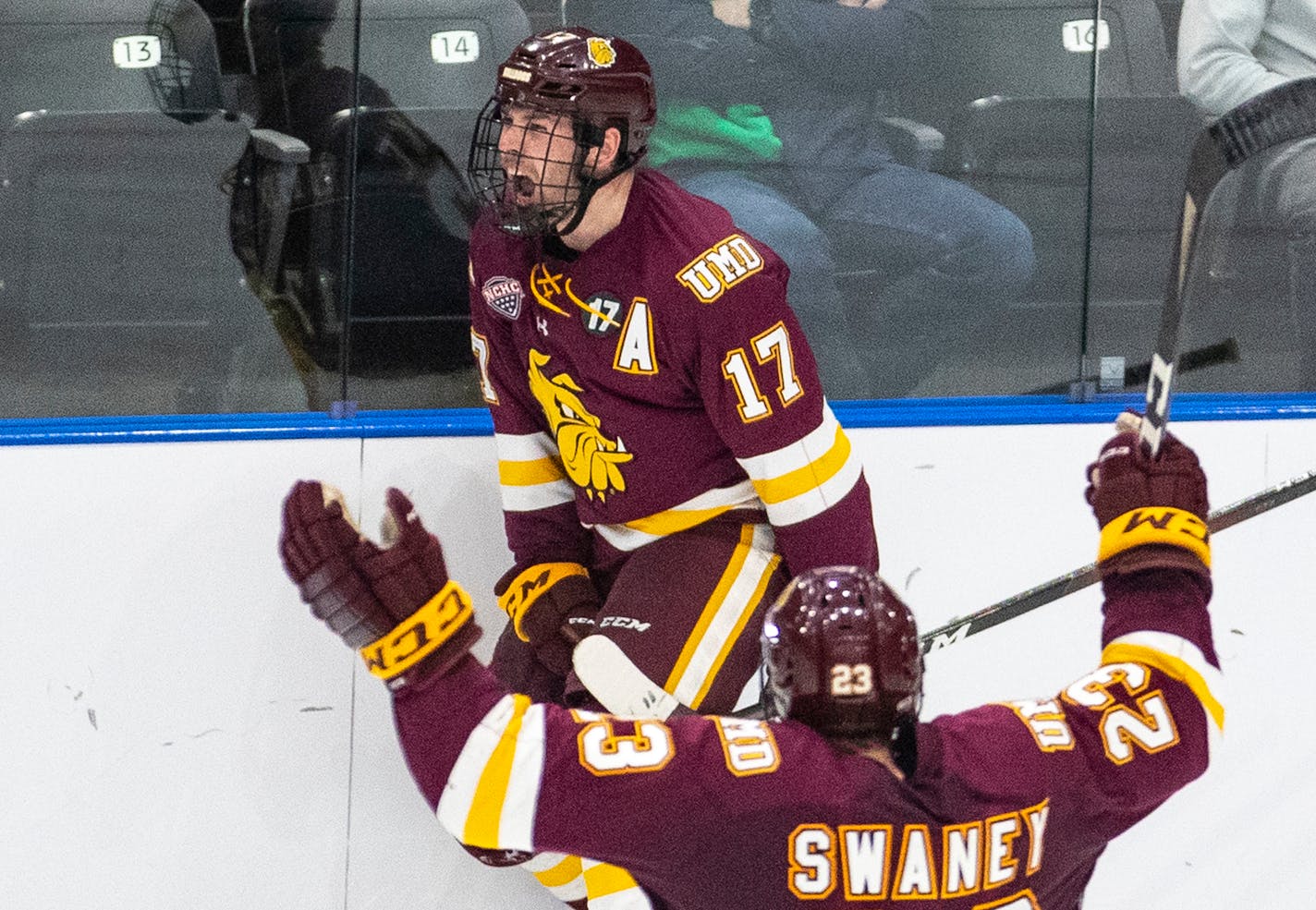 UMD Bulldogs forward Cole Koepke (17) celebrated after scoring a goal to give UMD a 2-0 lead in the third period. ]