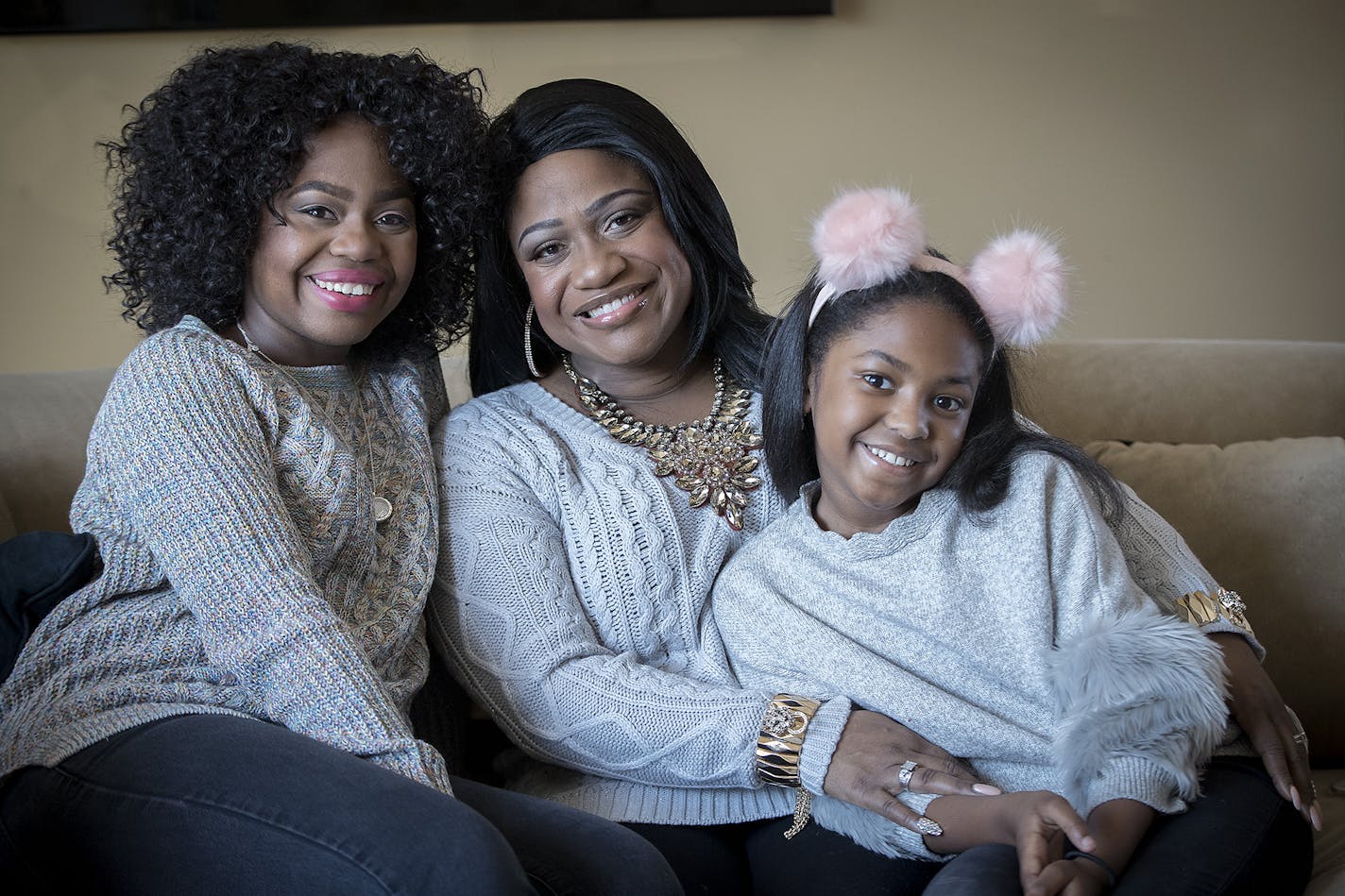 Paris Bennett, left, with her mother, Jamecia — who's co-starring as Glinda the Good Witch in "The Wiz" — and daughter, Egypt.