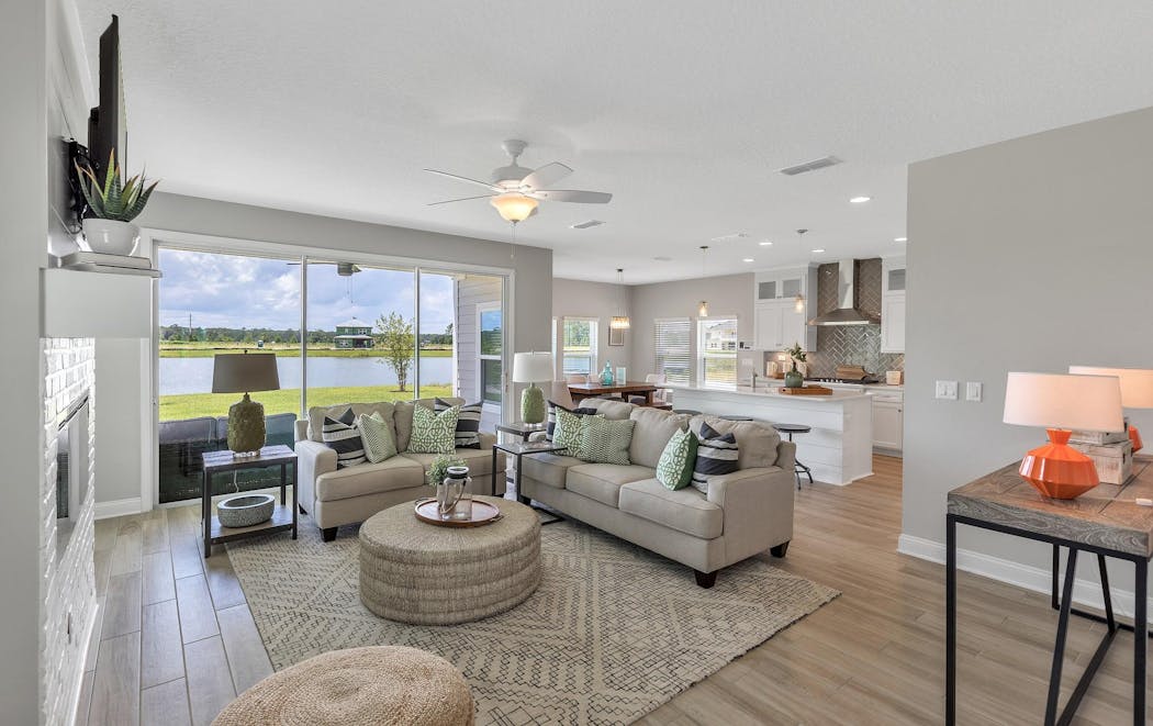 A model home in Florida features a modern farmhouse style and neutral color palette with color pops.