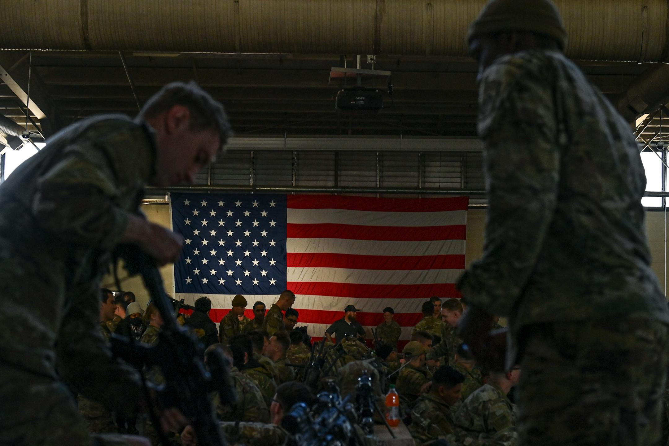 Troops at Fort Bragg in North Carolina prepare to deploy to Eastern Europe on Monday, Feb. 14, 2022. "Whatever happens next in Ukraine, it won't matter as much as the lessons we draw from it," writes Bret Stephens, a New York Times opinion columnist. "Only the innocent think that an America that turns its back on the world will be left alone in turn." (Kenny Holston/The New York Times)