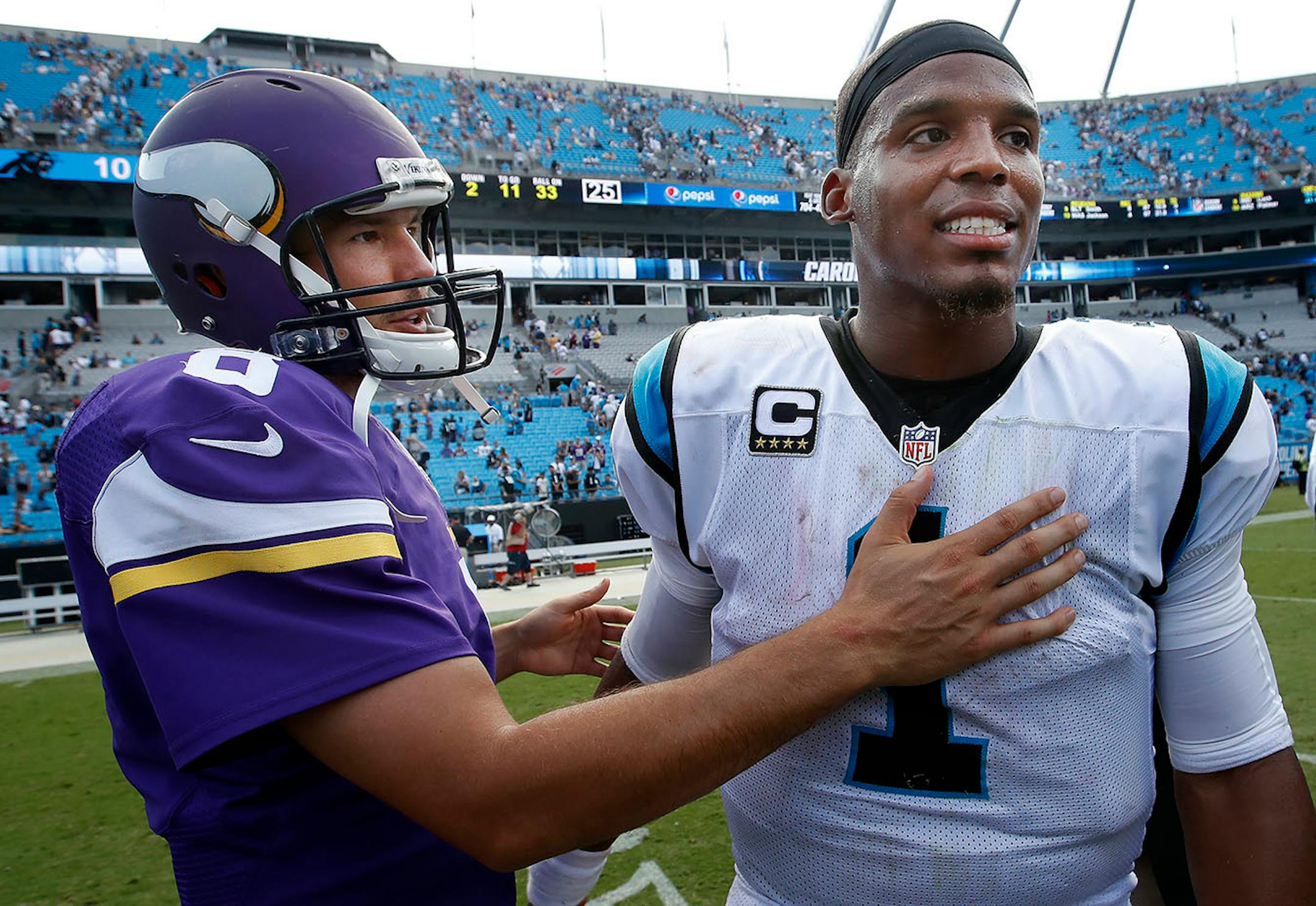 Quarterbacks Sam Bradford and Cam Newton greeted each other at the end of the game. Minnesota beat Carolina by a final score of 22-10.