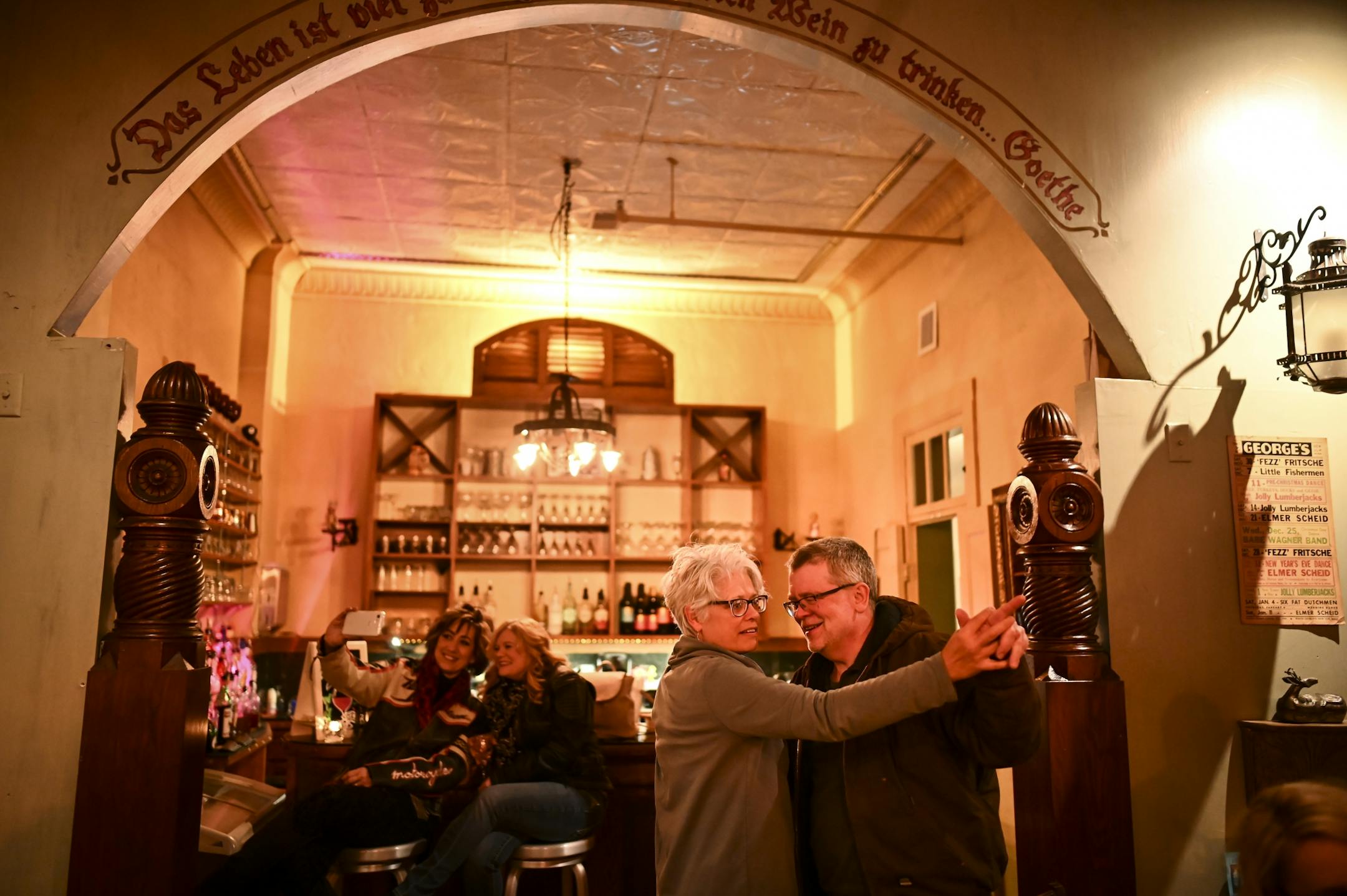 Jeff and Becky Braegelmann, married 35 years and from New Ulm, danced to music by "Bee Balm Fields" Friday night near the bar at "The Grand Kabaret."