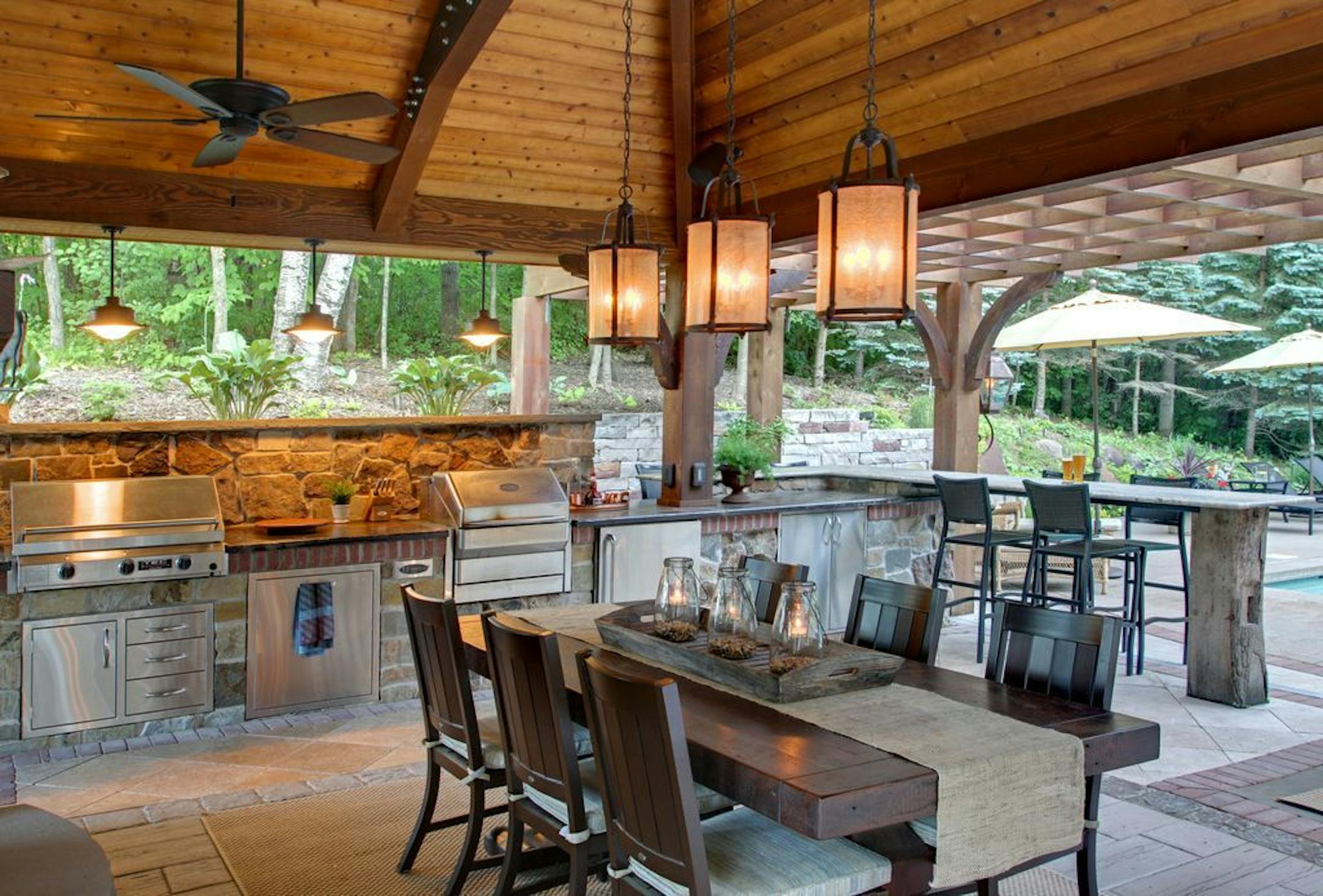 There's an outdoor kitchen with two grills.