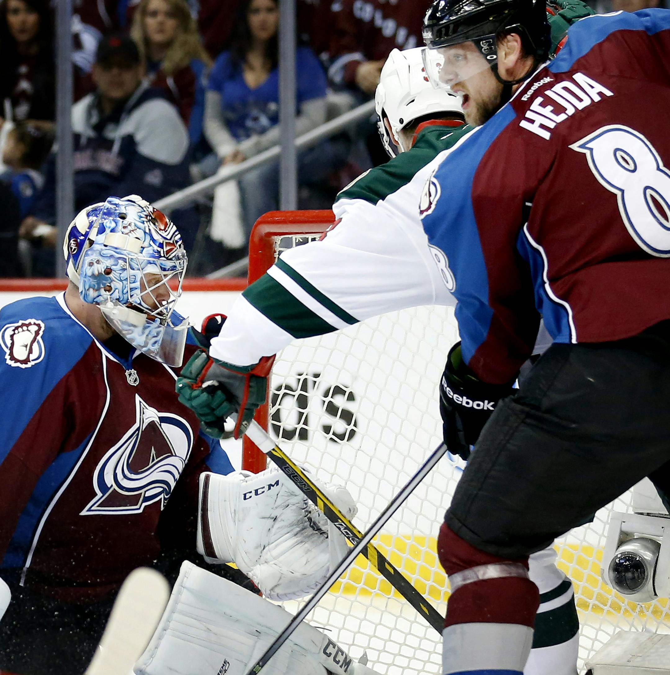 Charlie Coyle (3) got the puck past Colorado goalie Semyon Varlamov (1) for a goal in the first period. ] CARLOS GONZALEZ cgonzalez@startribune.com - April 19, 2014, Denver, Colorado, Pepsi Center, NHL, Minnesota Wild vs. Colorado Avalanche, Stanley Cup Playoffs round 1, Game 2