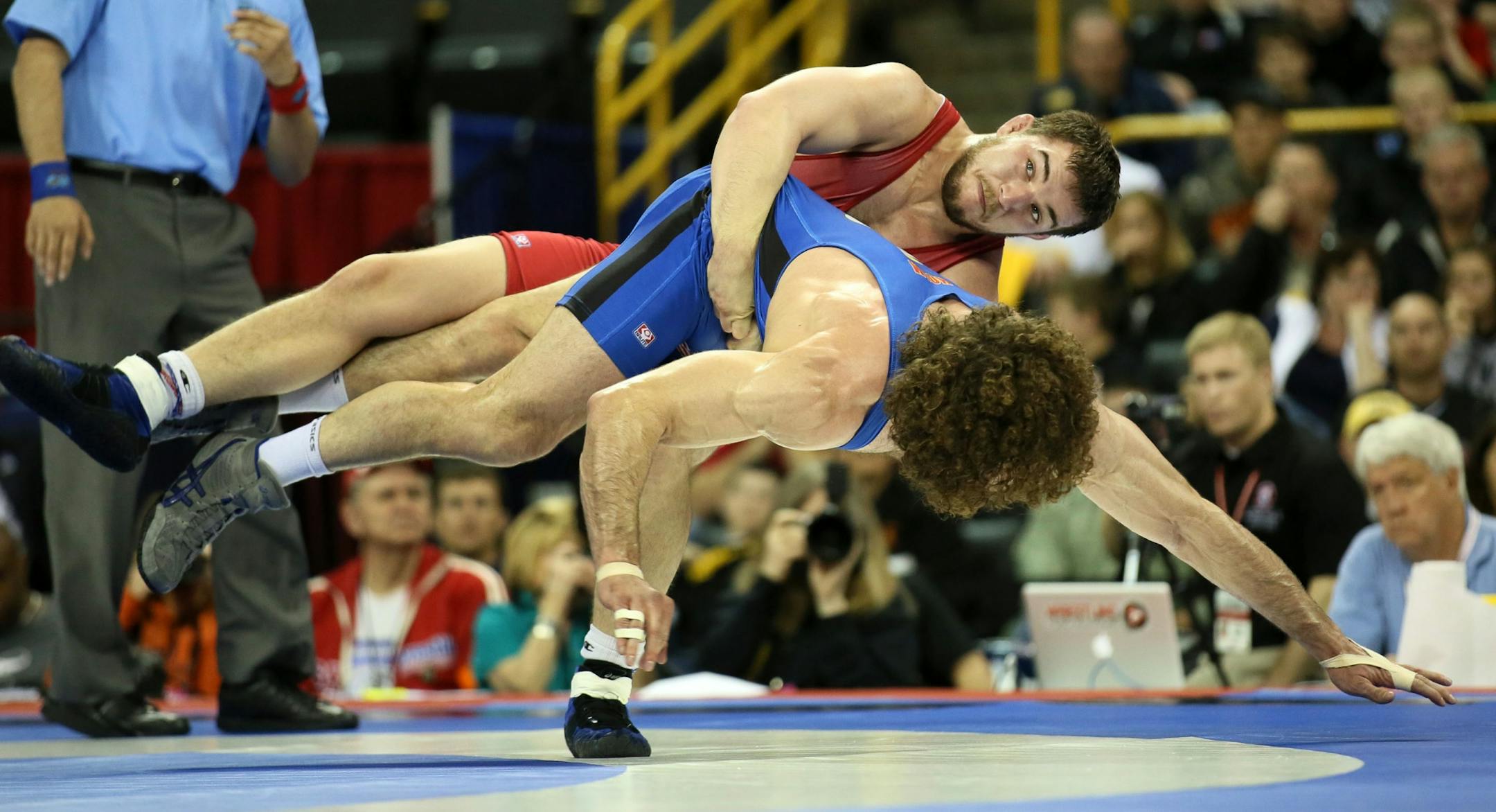 Minnesotan Jordan Holm is thrown out of the ring by Chas Betts.