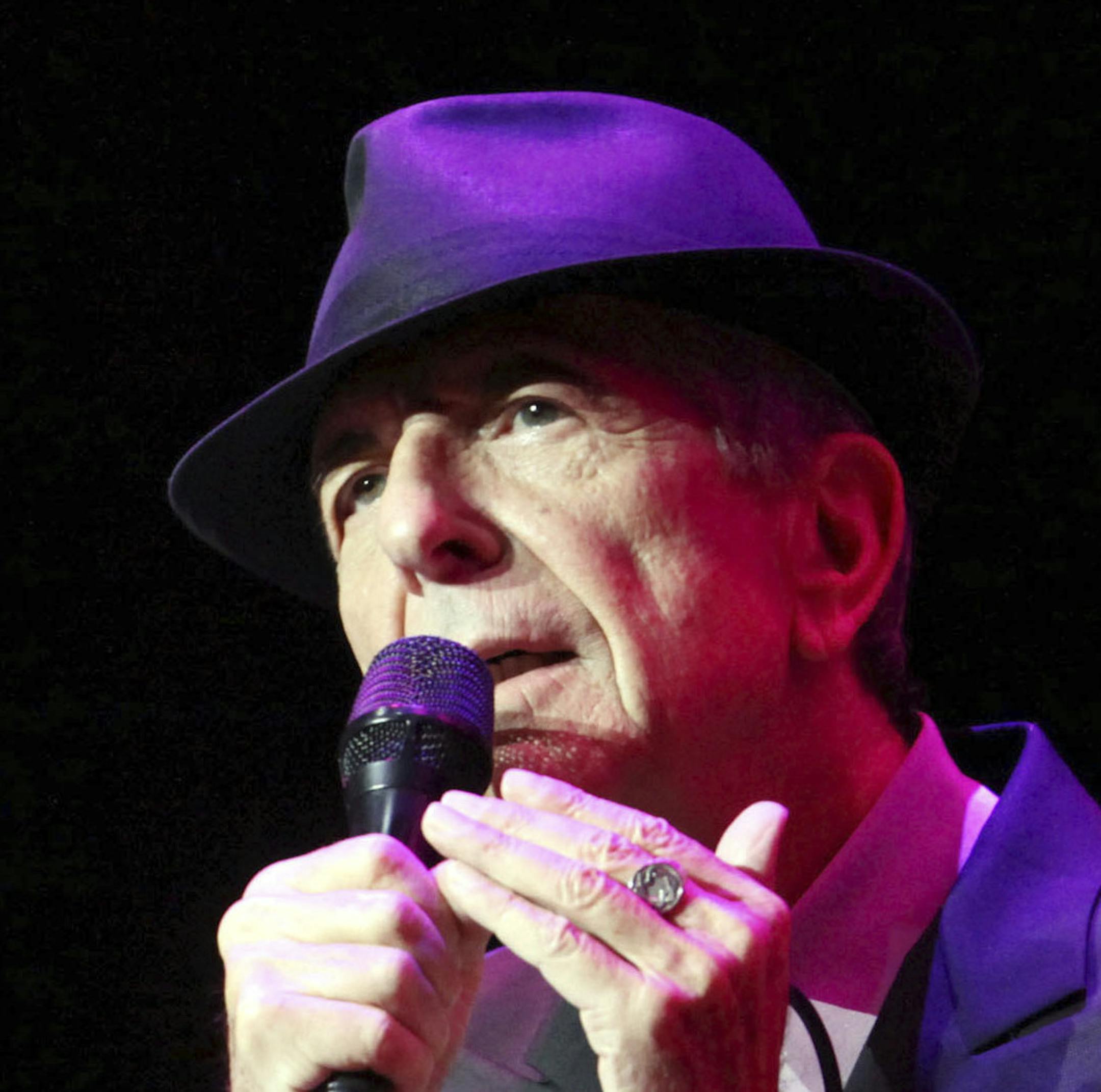 CORRECTS DATE OF STATEMENT- In this March 22, 2013 file photo, Leonard Cohen performs on the Old Ideas World Tour, at The Fabulous Fox Theatre in Atlanta. Cohen, the gravelly-voiced Canadian singer-songwriter of hits like ìHallelujah,î "Suzanneî and "Bird on a Wire," has died, his management said in a statement Thursday, Nov. 10, 2016. He was 82. (Photo by Robb D. Cohen/RobbsPhotos/Invision/AP, File)