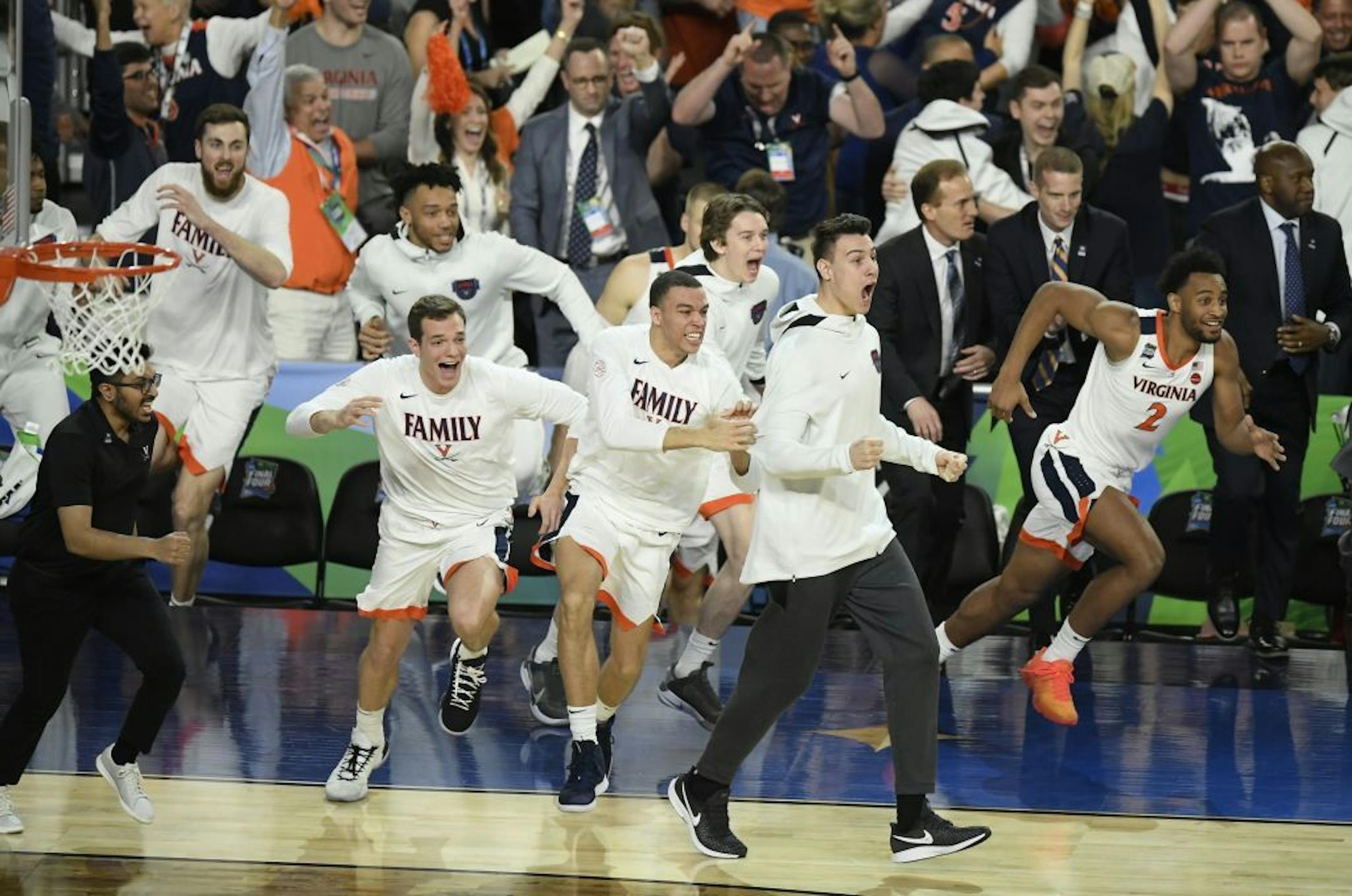 Virginia bench erupted after winning against Auburn 63-62 .