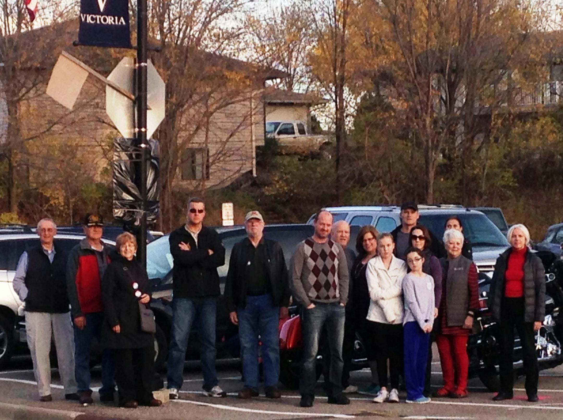 Victoria residents opposing the Victoria Flats building gathered Tuesday night on the downtown corner where the apartments will be built. Along with dozens of other residents, most attended the cityís public hearing on the project the week before to voice their objections. The developer plans to break ground by the end of November.