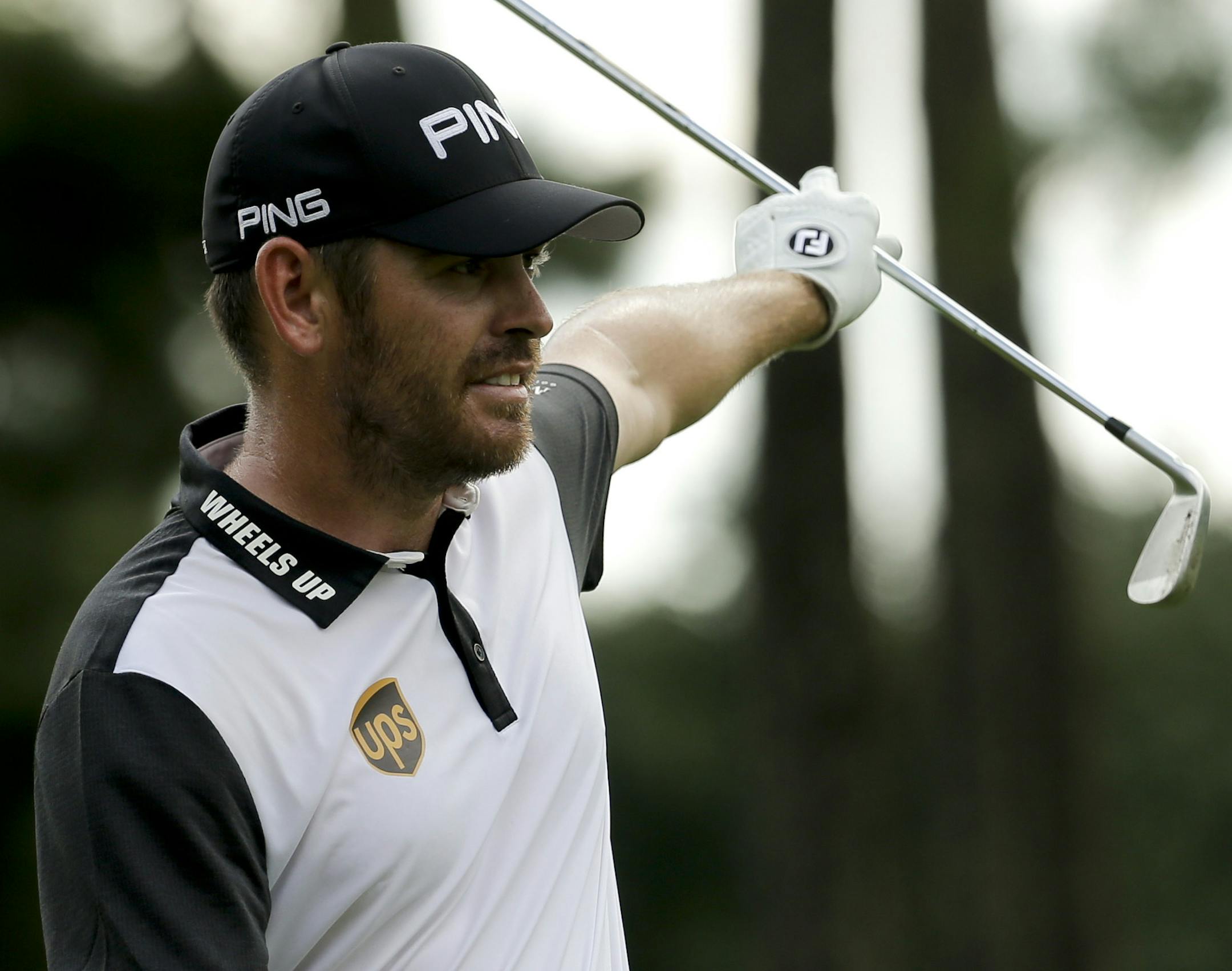 Louis Oosthuizen of South Africa, reacts on the ninth hole during the third round of the PGA Championship golf tournament at the Quail Hollow Club Saturday, Aug. 12, 2017, in Charlotte, N.C. (AP Photo/Chuck Burton)