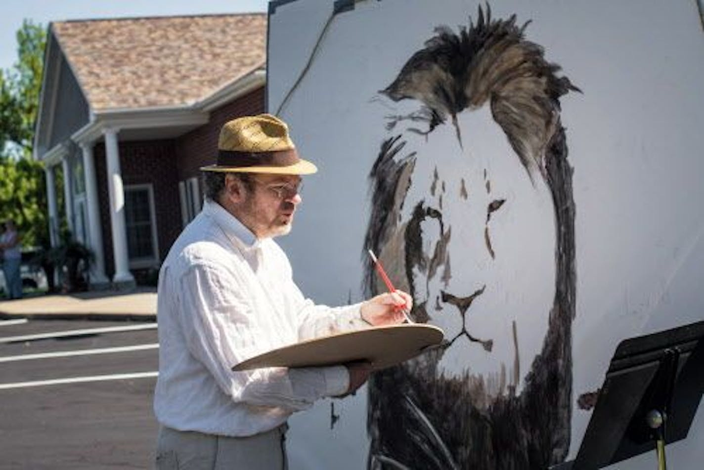 Artist Mark Balma painted a mural of Cecil in the parking lot of Dr. Walter Palmer's dental office in Bloomington. Balma went to school in the Twin Cities and was visiting friends when he decided to come down for a "silent protest."