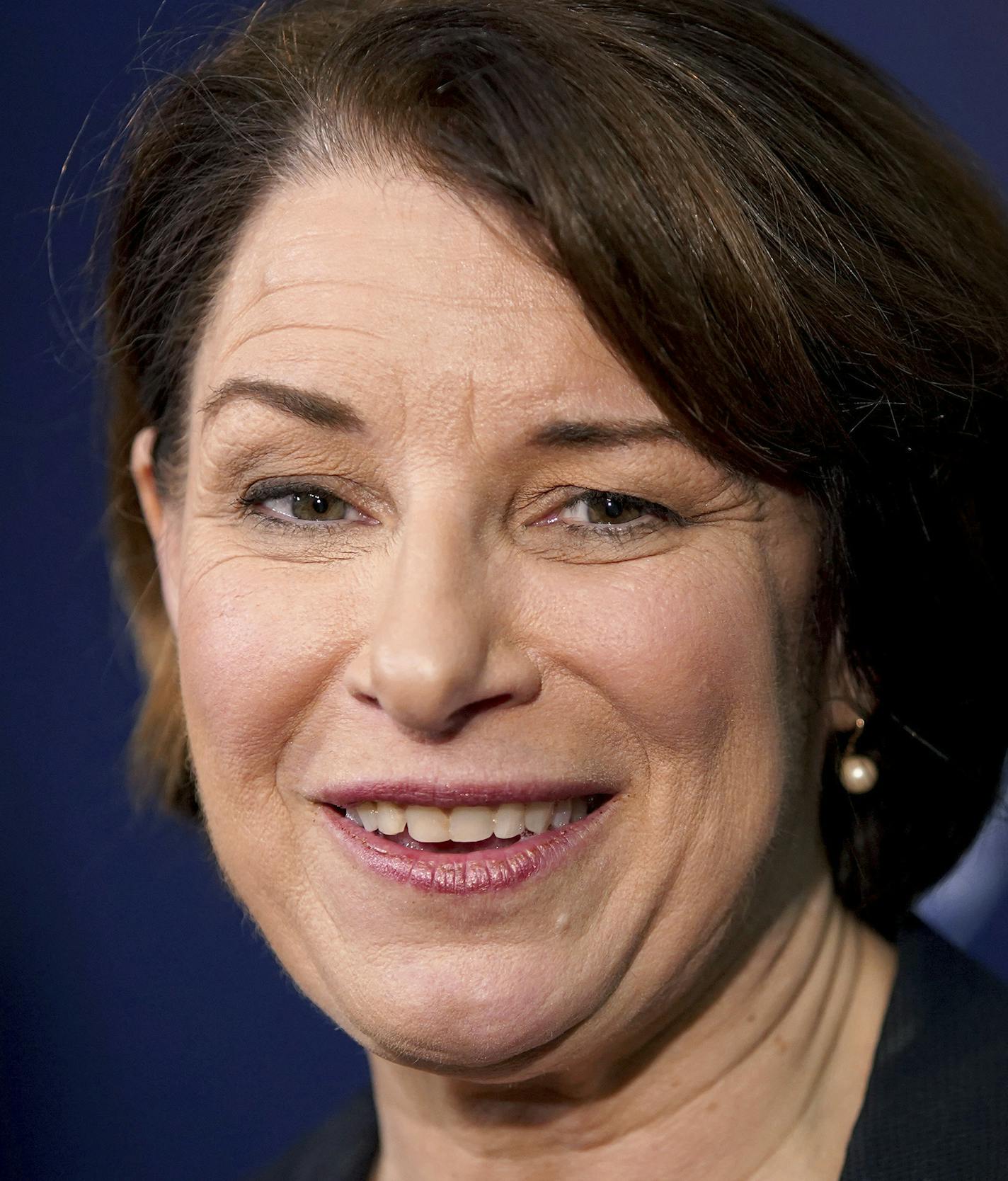 Democratic presidential candidate Sen. Amy Klobuchar, D-Minn., speaks to the media following a campaign stop, Friday, Nov. 22, 2019, in Henniker, N.H. (AP Photo/Mary Schwalm)