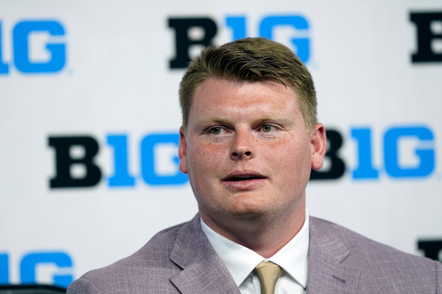 Minnesota offensive lineman John Michael Schmitz talks to reporters during an NCAA college football news conference at the Big Ten Conference media days, Tuesday, July 26, 2022, at Lucas Oil Stadium in Indianapolis. (AP Photo/Darron Cummings)