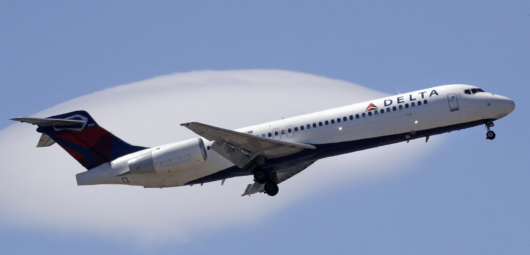 A Delta Air Lines passenger jet plane approached Logan Airport in Boston.