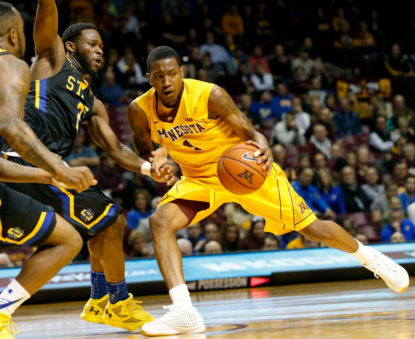 Gophers guard Dupree McBrayer, driving against South Dakota State.