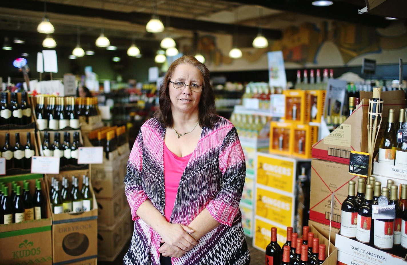 Born and raised in Lakeville, Brenda Visnovec, director of operations at Lakeville muni liquor stores, is one of the rare competitors taking on Total Wine head on. She was photographed at the Lakeville Liquor store on Kenrick Avenue Tuesday, June 16, 2015, in Lakeville, MN. ](DAVID JOLES/STARTRIBUNE)djoles@startribune.com Brenda Visnovec, director of operations at Lakeville muni liquor stores, is one of the rare competitors taking on Total Wine head on. She's run ads in the Lakeville paper compa